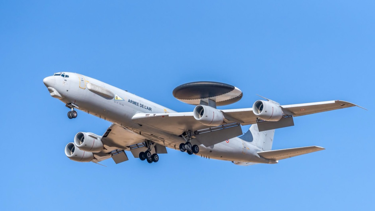 A high-altitude stealth surveillance aircraft flying over the desert
