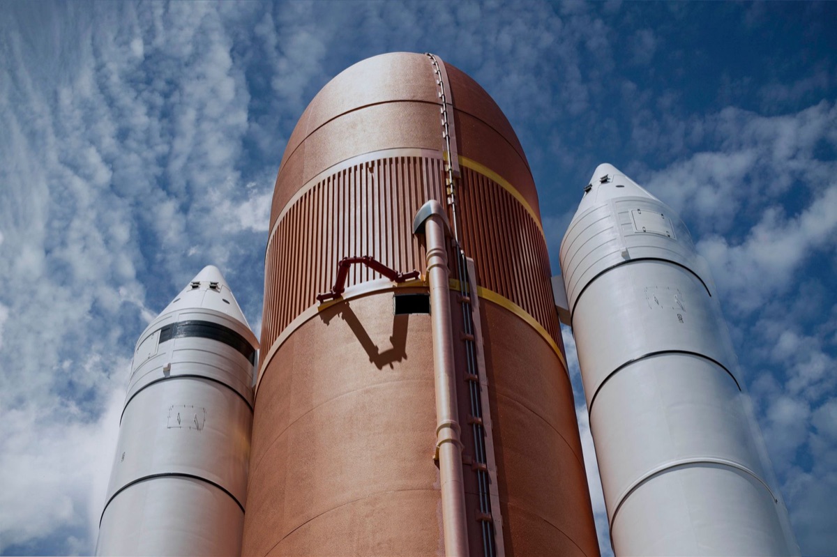kenneedy space center rocket launch with smoke and spectators