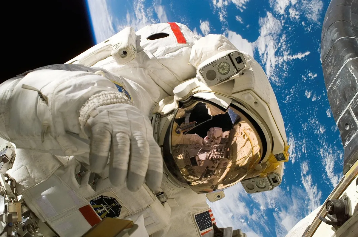 ai generated, astronaut, earth, space suit, space, mission, nasa